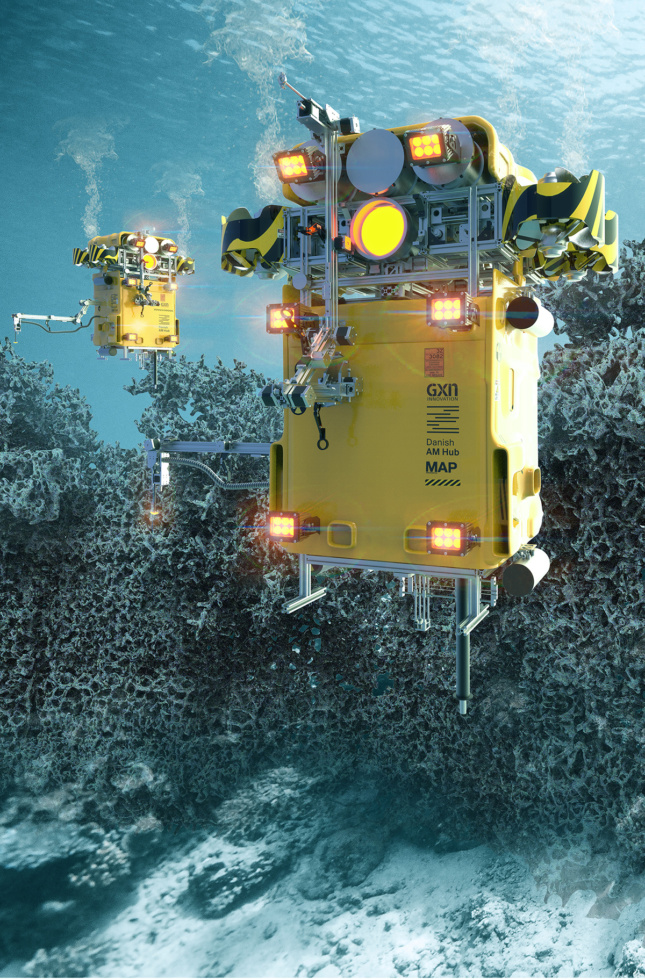 Rectangular yellow robots float undersea near a concrete-colored reef.