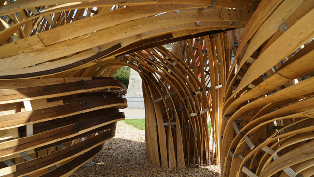 A curved timber pavilion