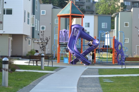 Cook Inlet Housing Authority: "The heart of our Loussac Place development features a play area for young residents and seating for parents." Courtesy Artplace America