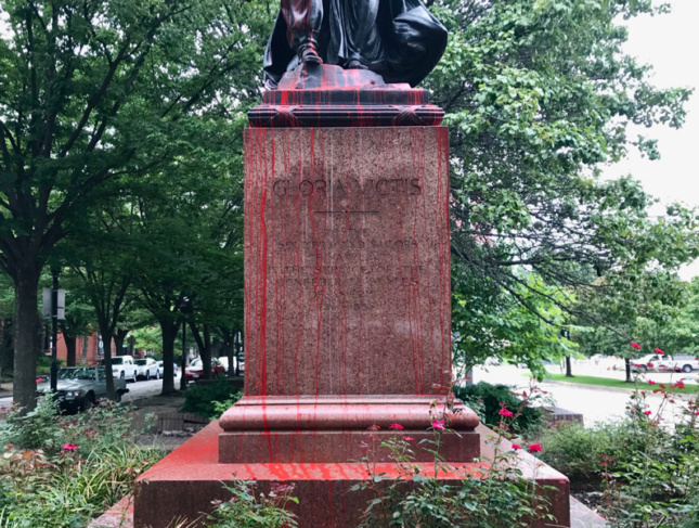 Base of the Confederate Soldiers and Sailors Monument splashed with red paint on August 14, two days before the City of Baltimore removed its Confederate monuments from public spaces. (Eli Pousson)