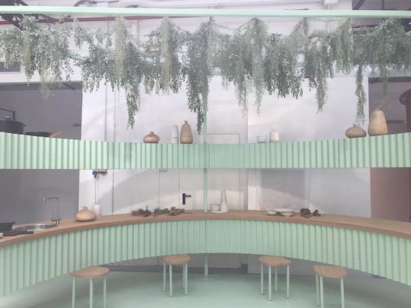 A verdant communal kitchen anchors four living modules in Studio Mama's design for Mini Living (Olivia Martin/AN) 