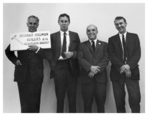 Black and white photo of four men, the far left being George Kostritsky