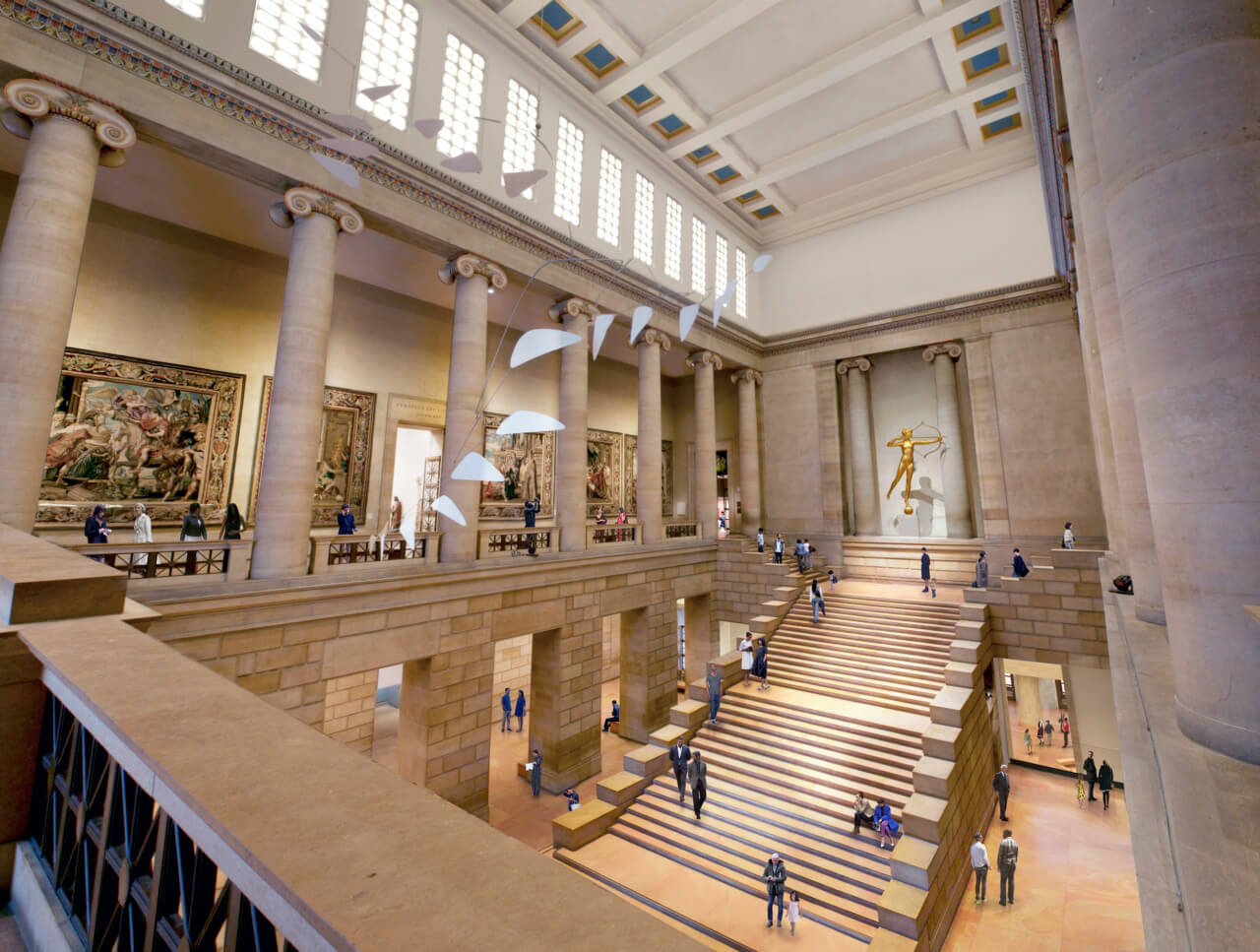 a grand stair hall in a museum