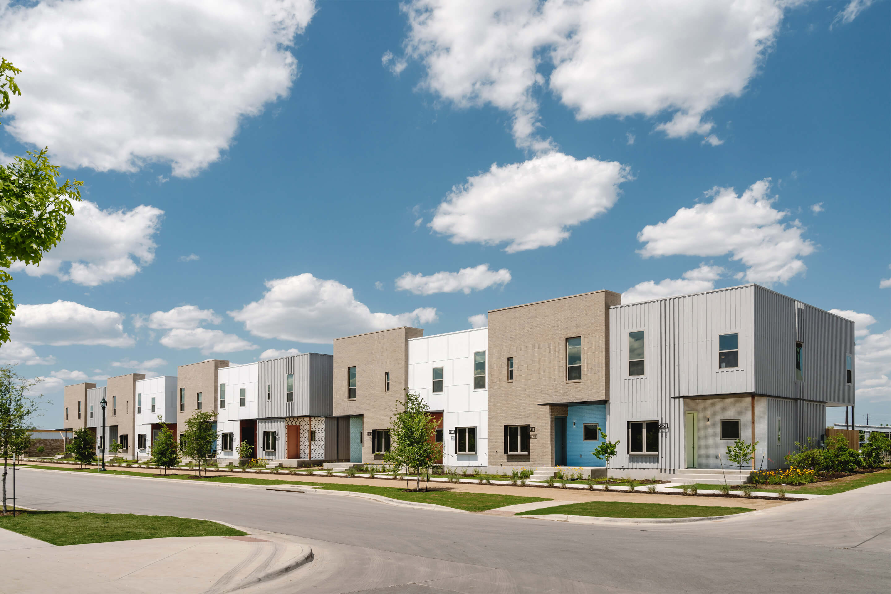 Families move into Austin Habitat for Humanity's affordable Mueller  townhomes