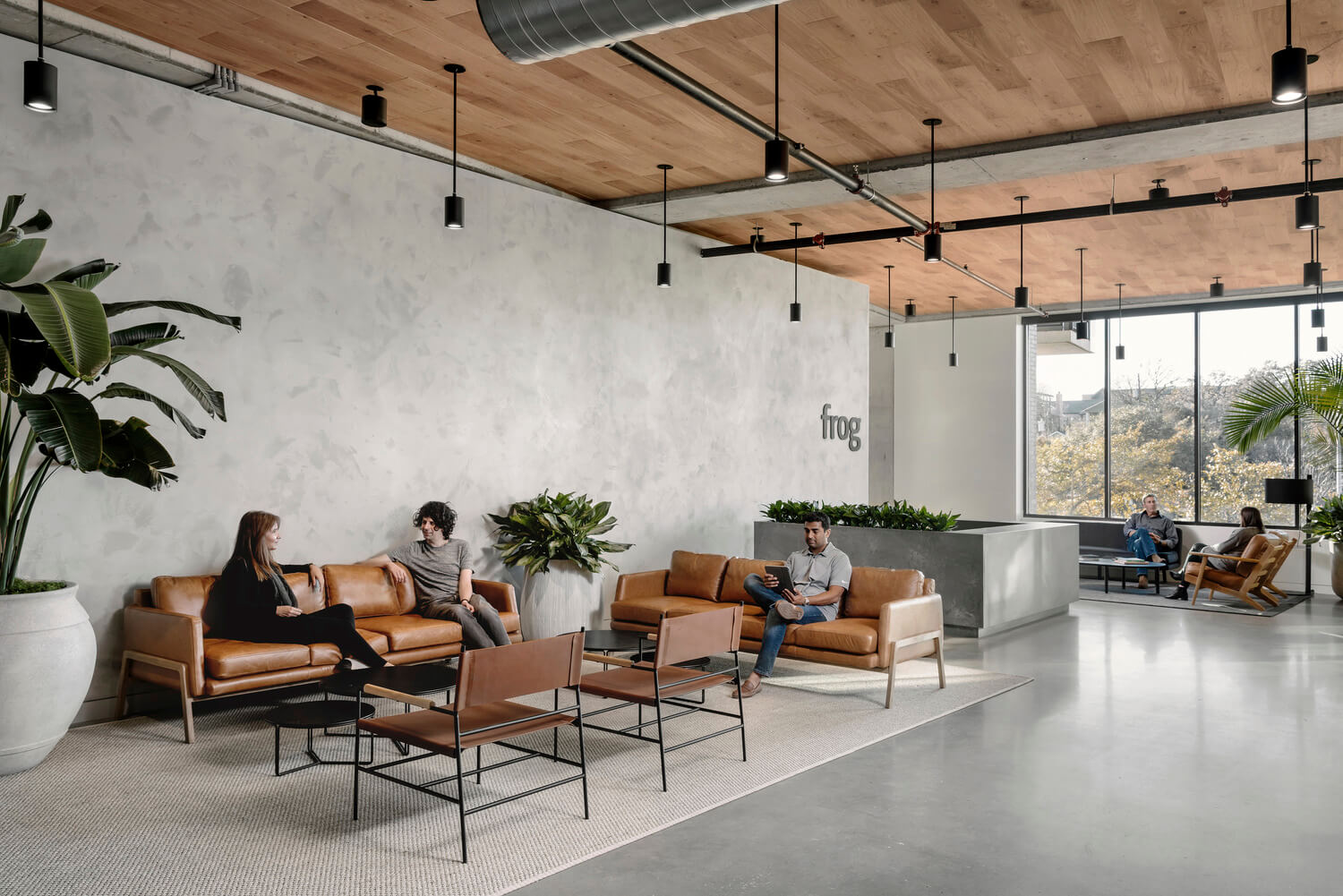 office space with gray walls and wood ceiling