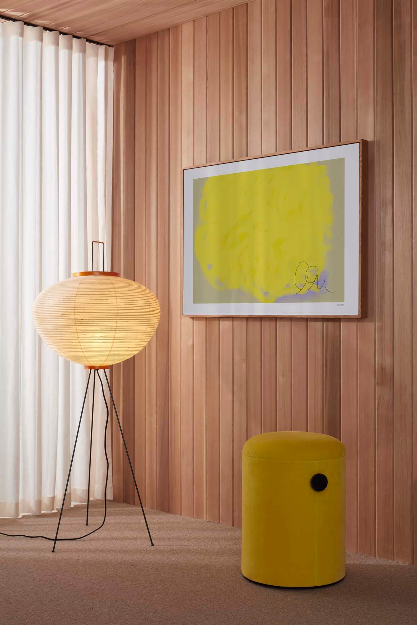 Corner of a room covered in warm wooden panels offers a base for acoustic contemporary art by Abstracta x Wall of Art.