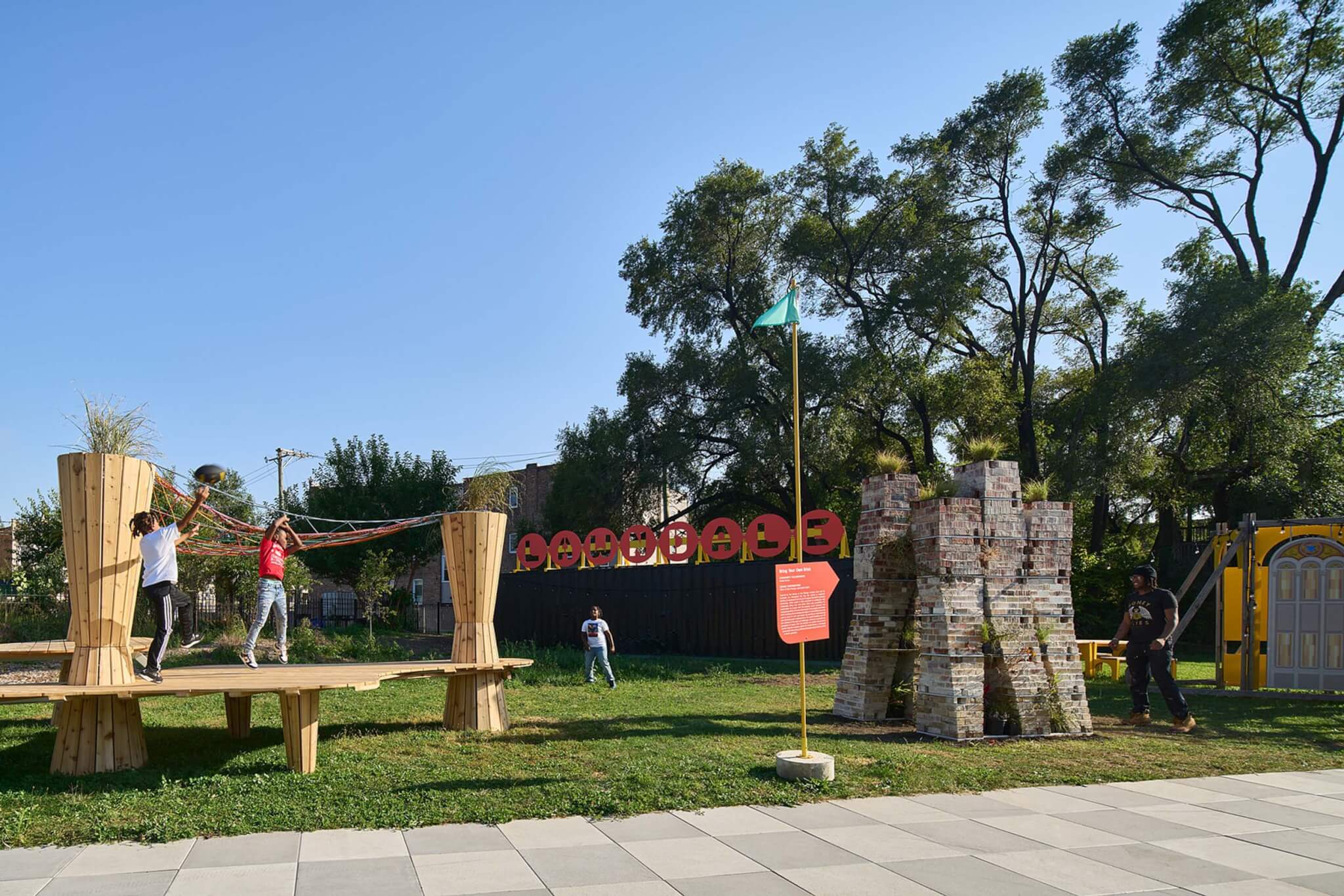 installations include a wood structure with platforms and a small castle-like structure