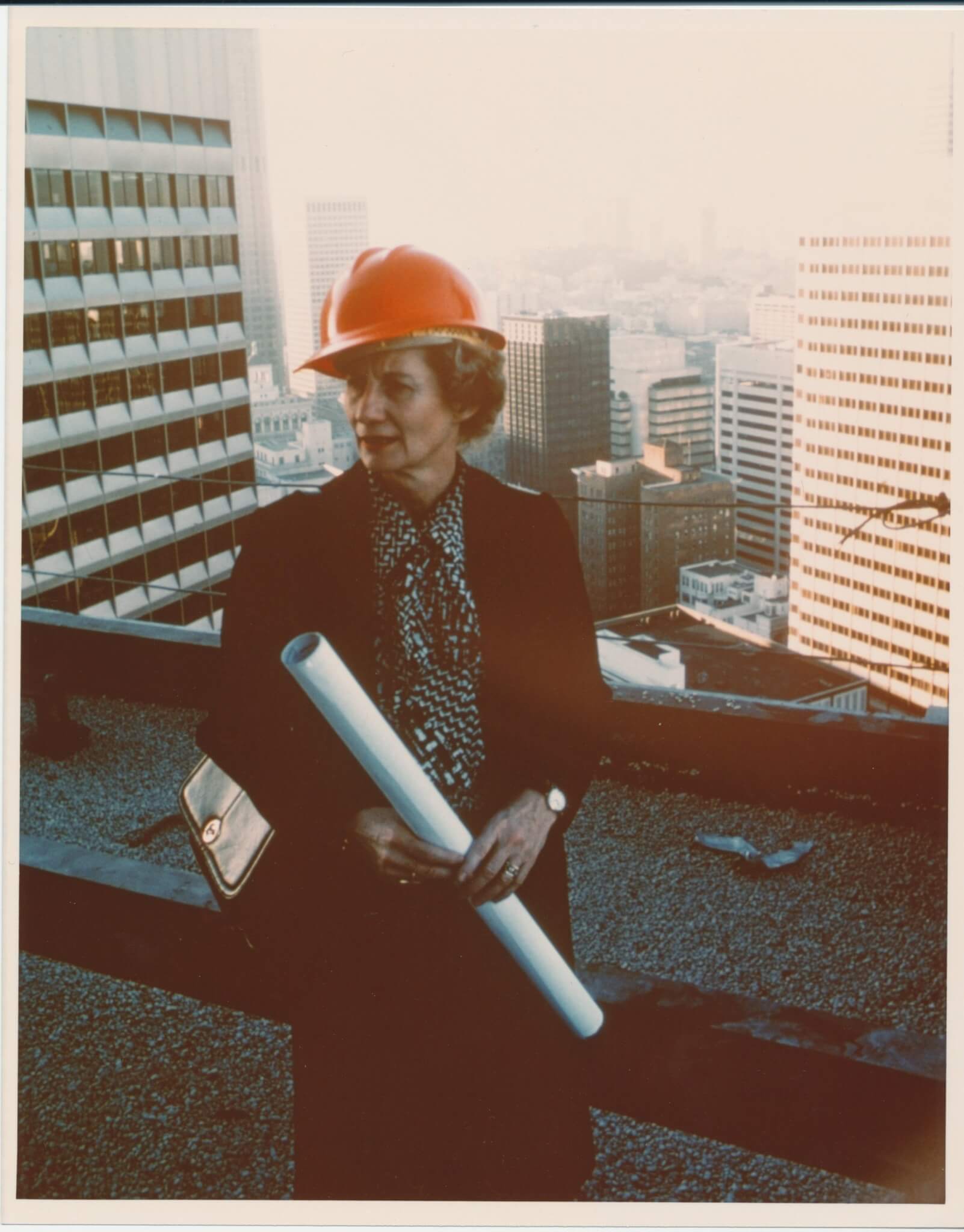 Beverly Willis in a hard hat at a construction site