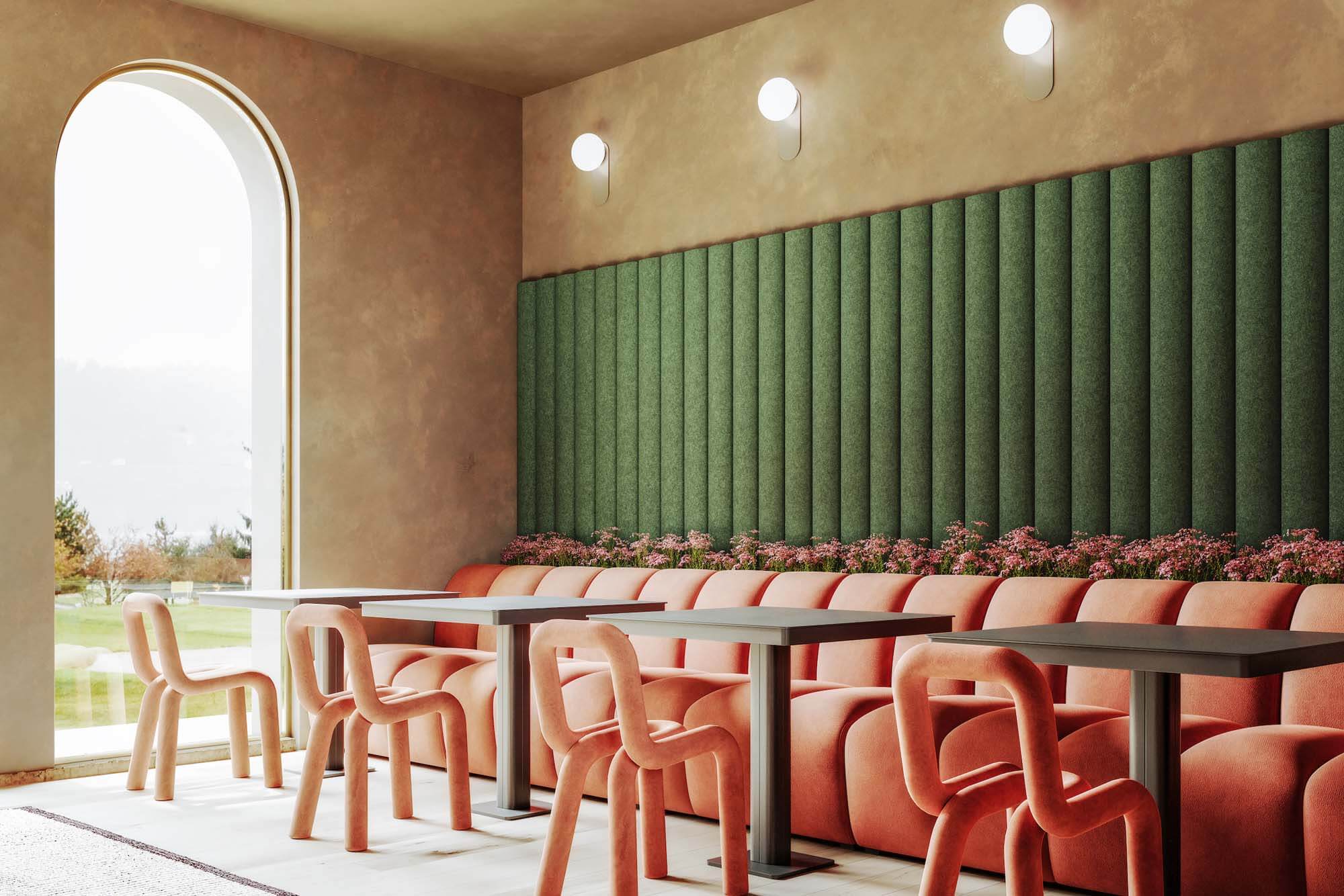 Restaurant with contemporary furnishings placed in front of green acoustic Reed Wall Panels by Turf.