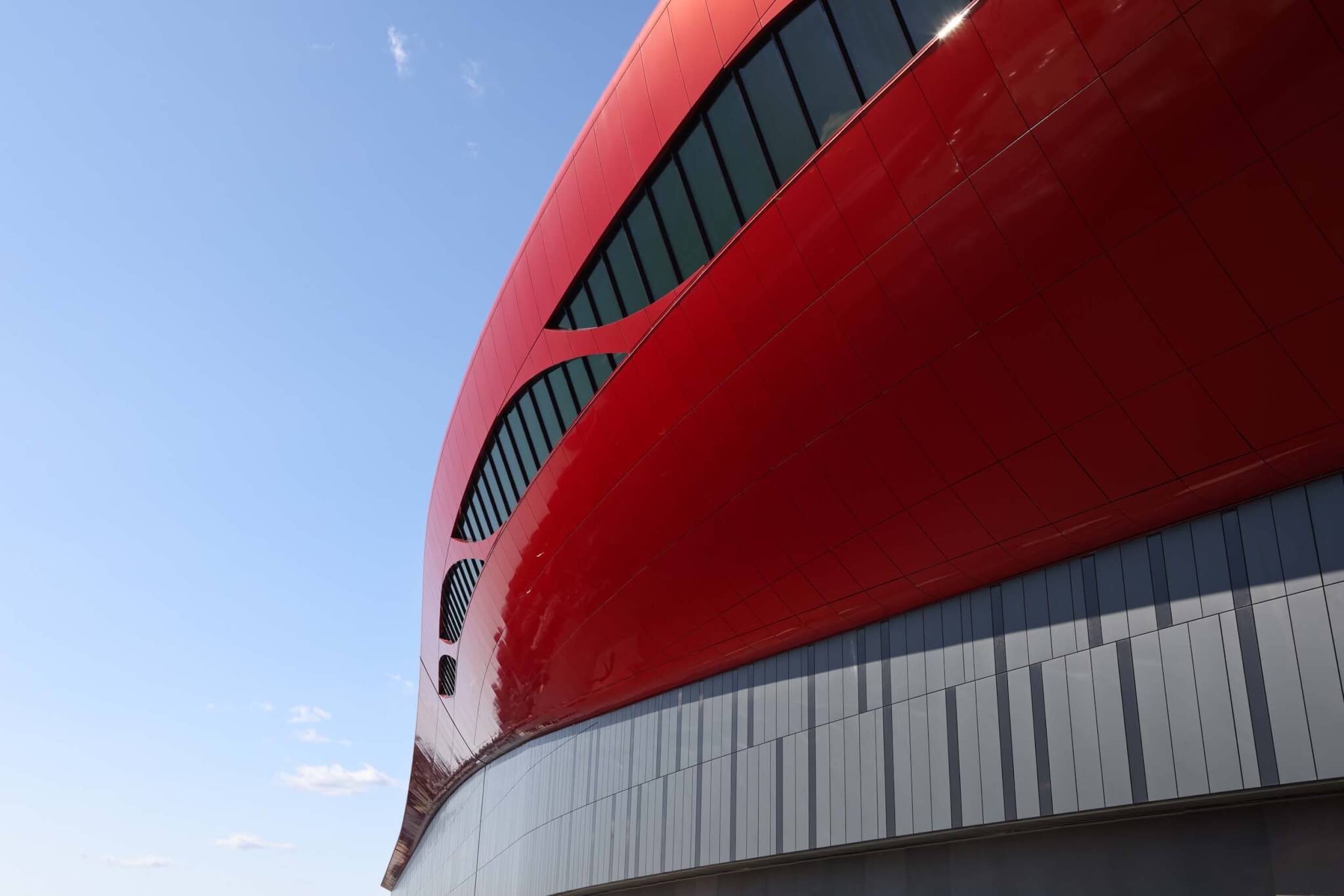 luis vidal + architects tops Logan Airport’s Terminal E with a prismatic red volume