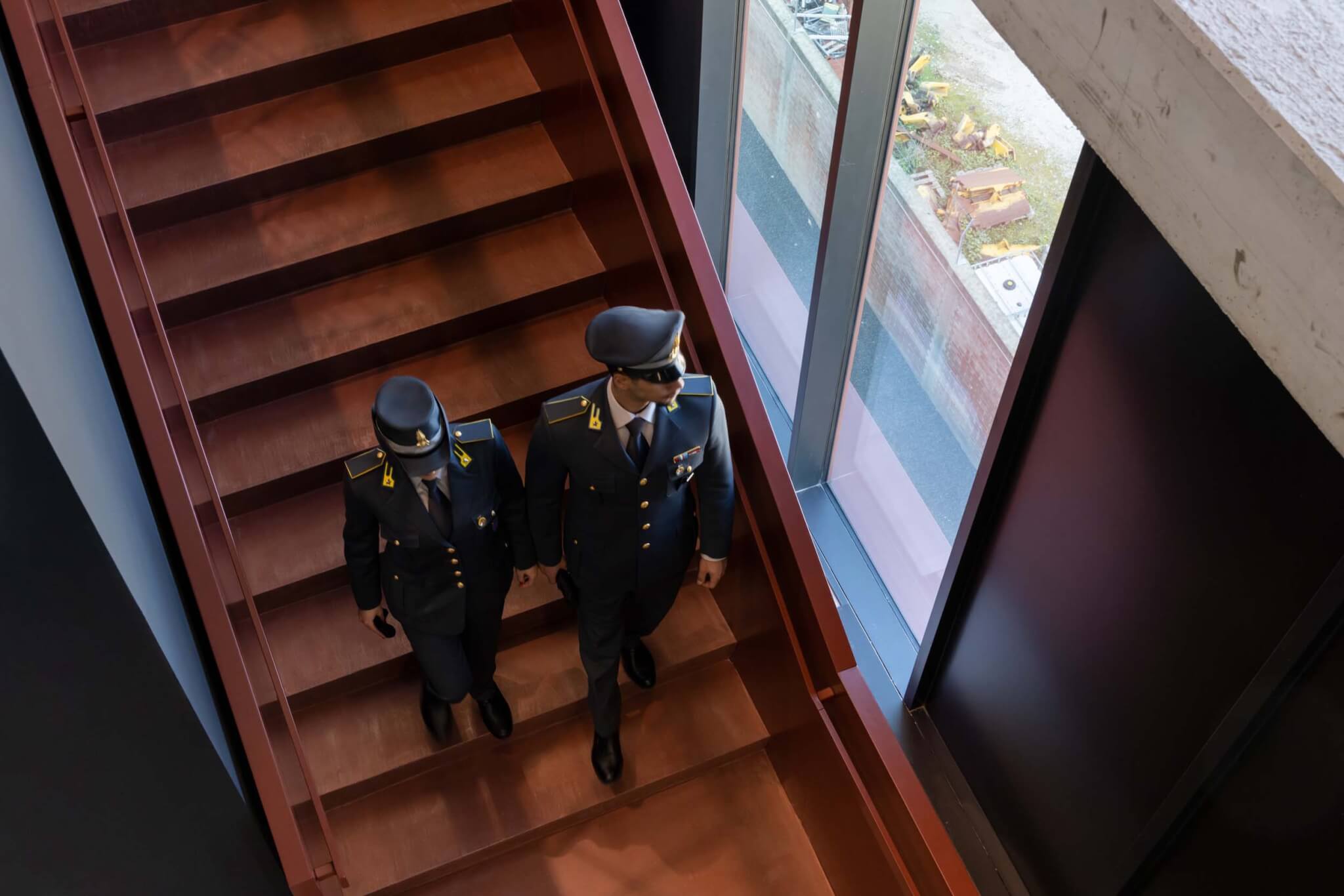 Two police officers walked down the stairs