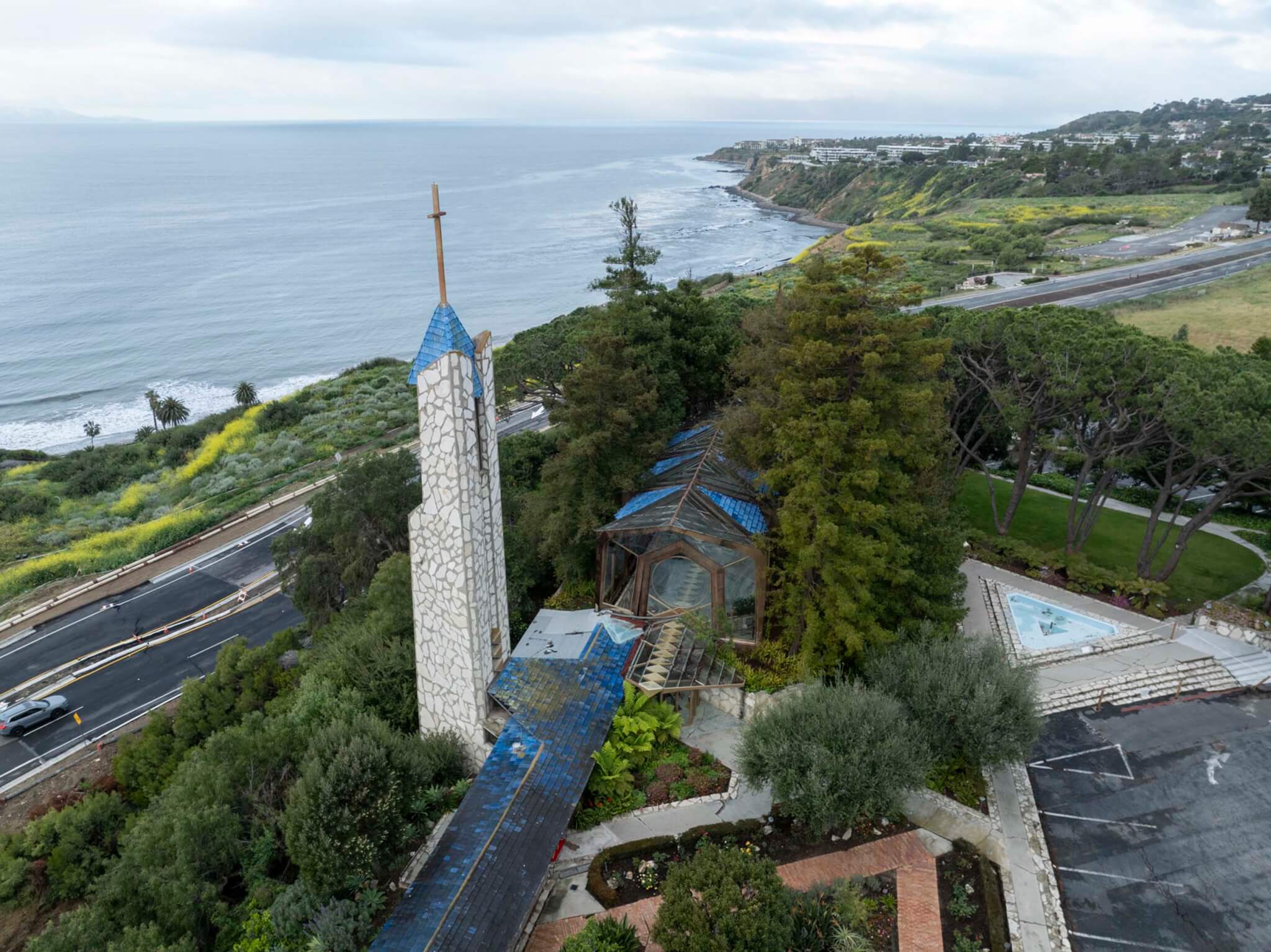 aerial view of site with bell tower shooting up