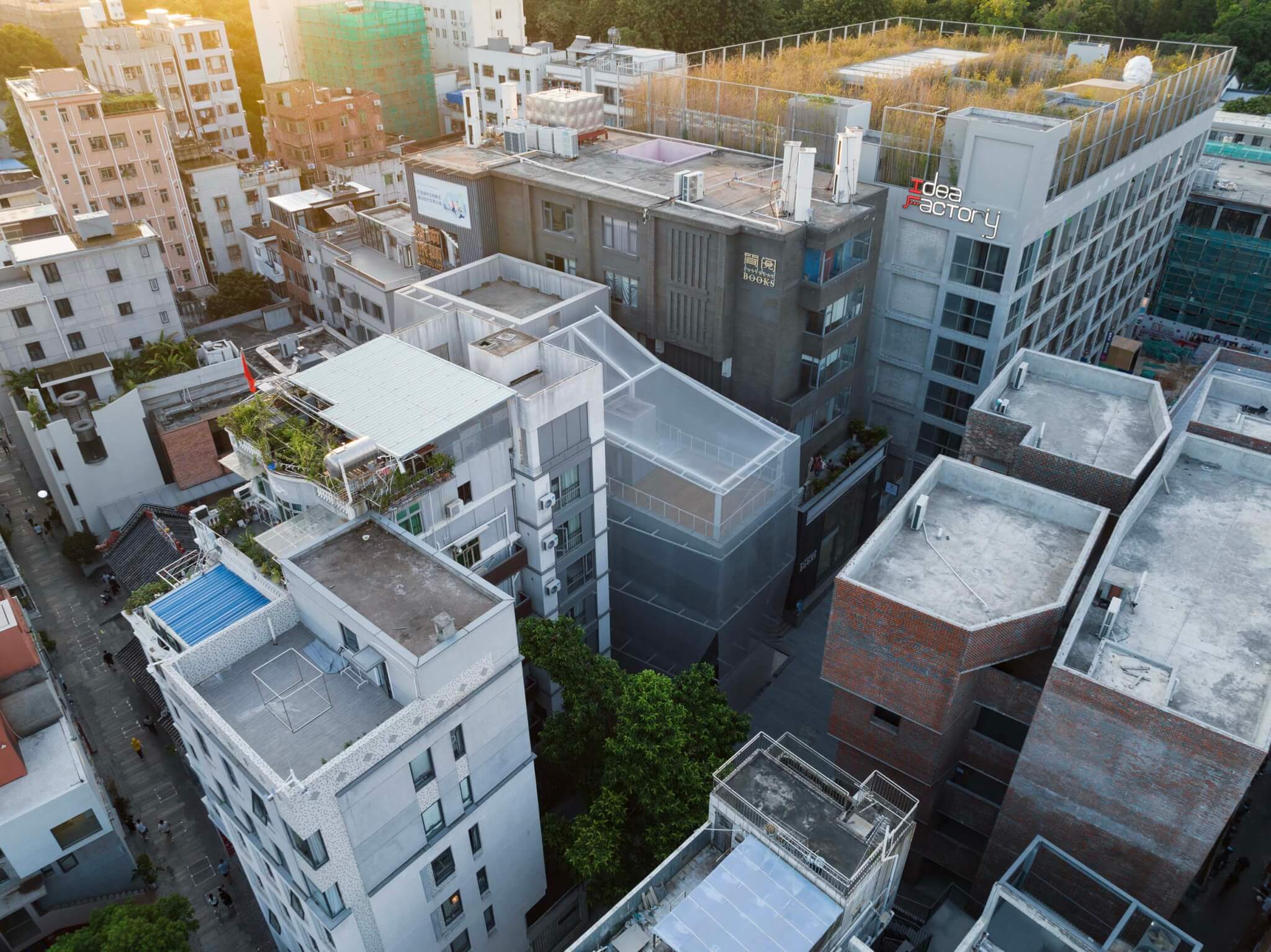 aerial view of neighborhood with In-Between Pavilion at the center