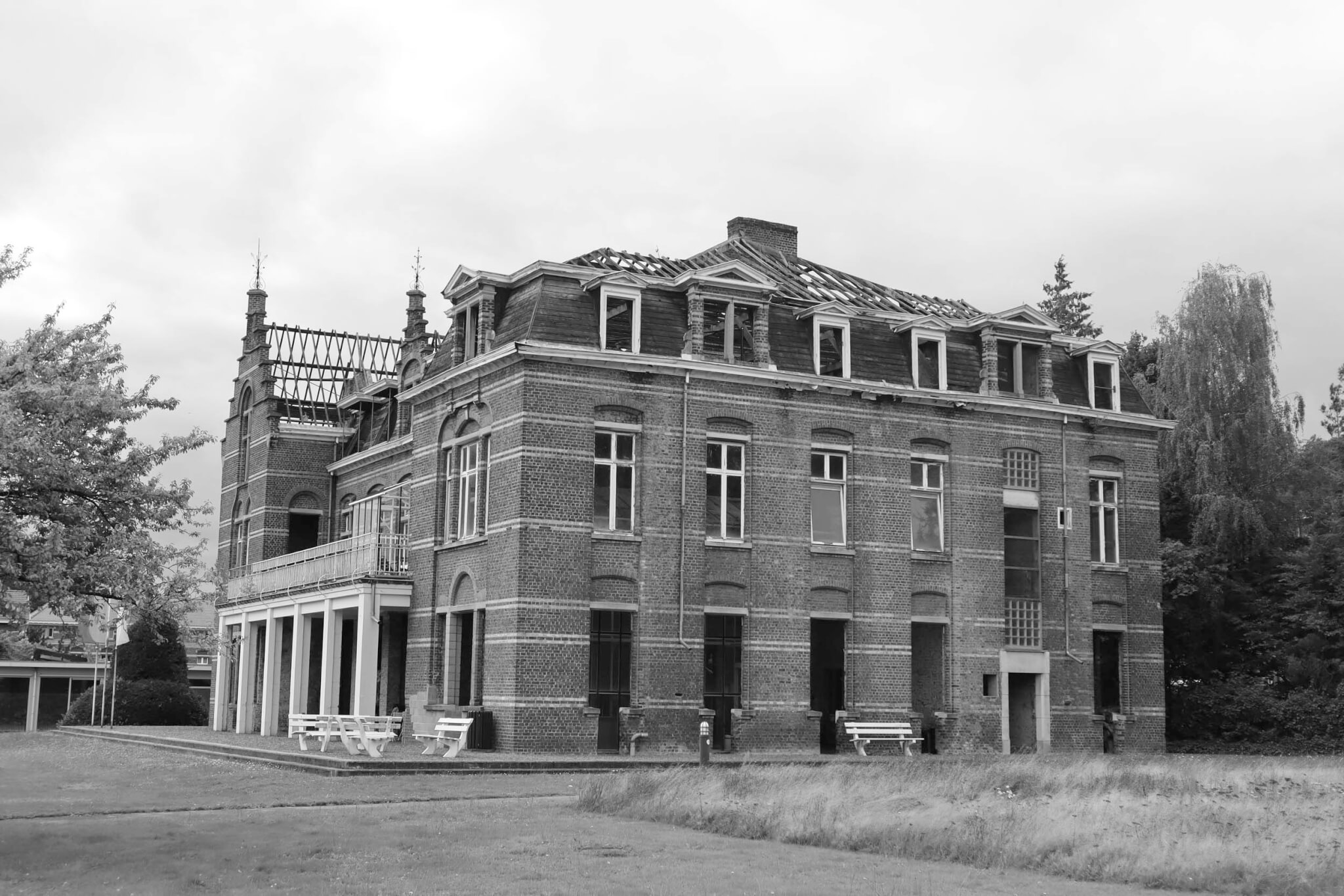 black and white photo of brick building