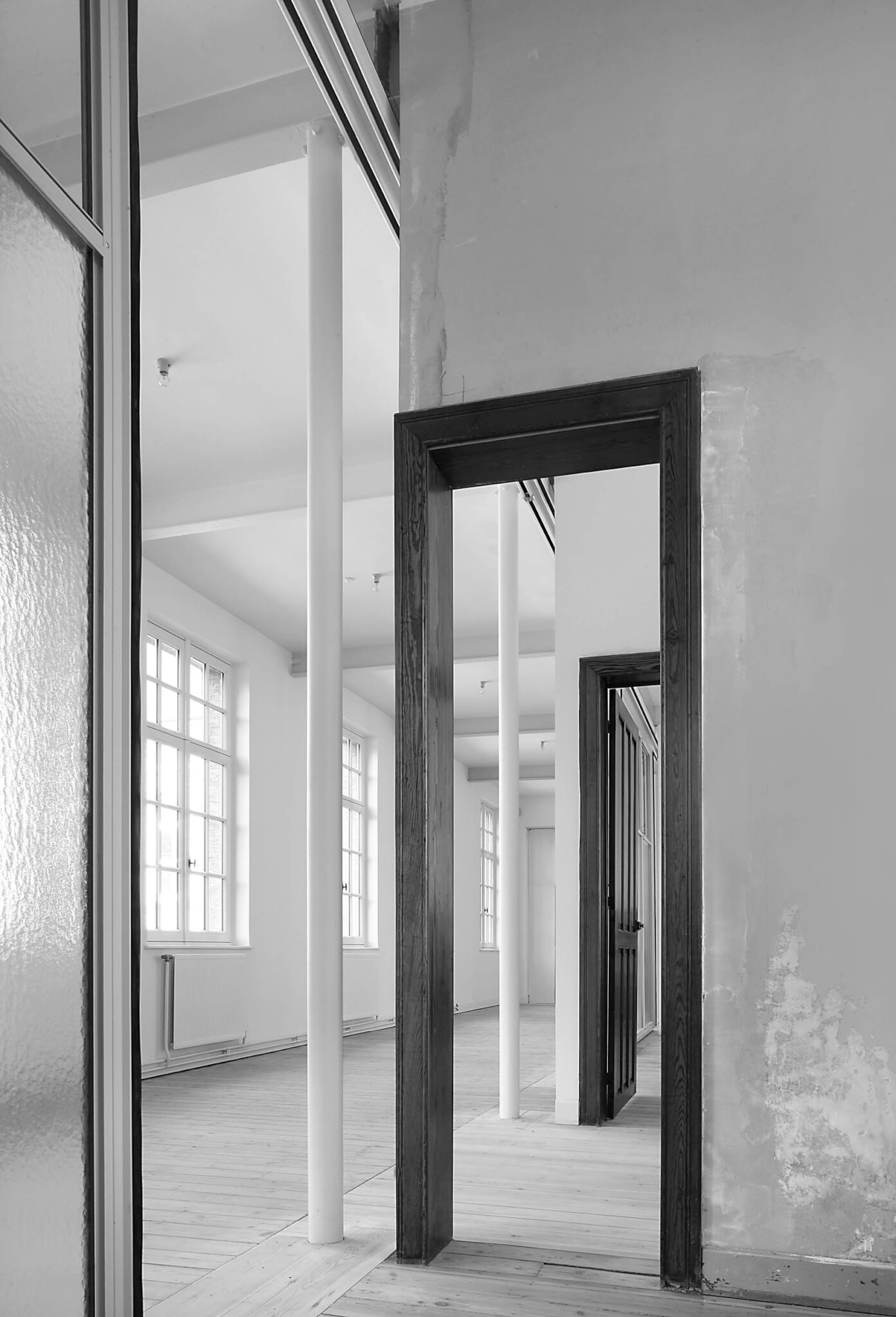 black and white photo of doorways