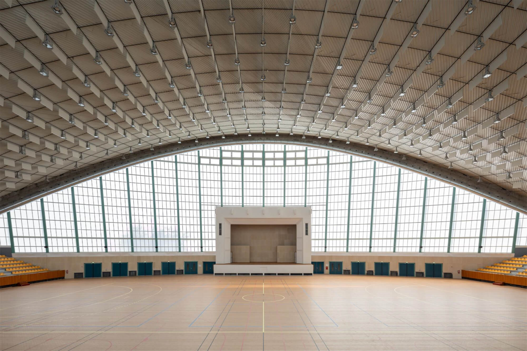 interiors showing the ceiling height and gridded windows