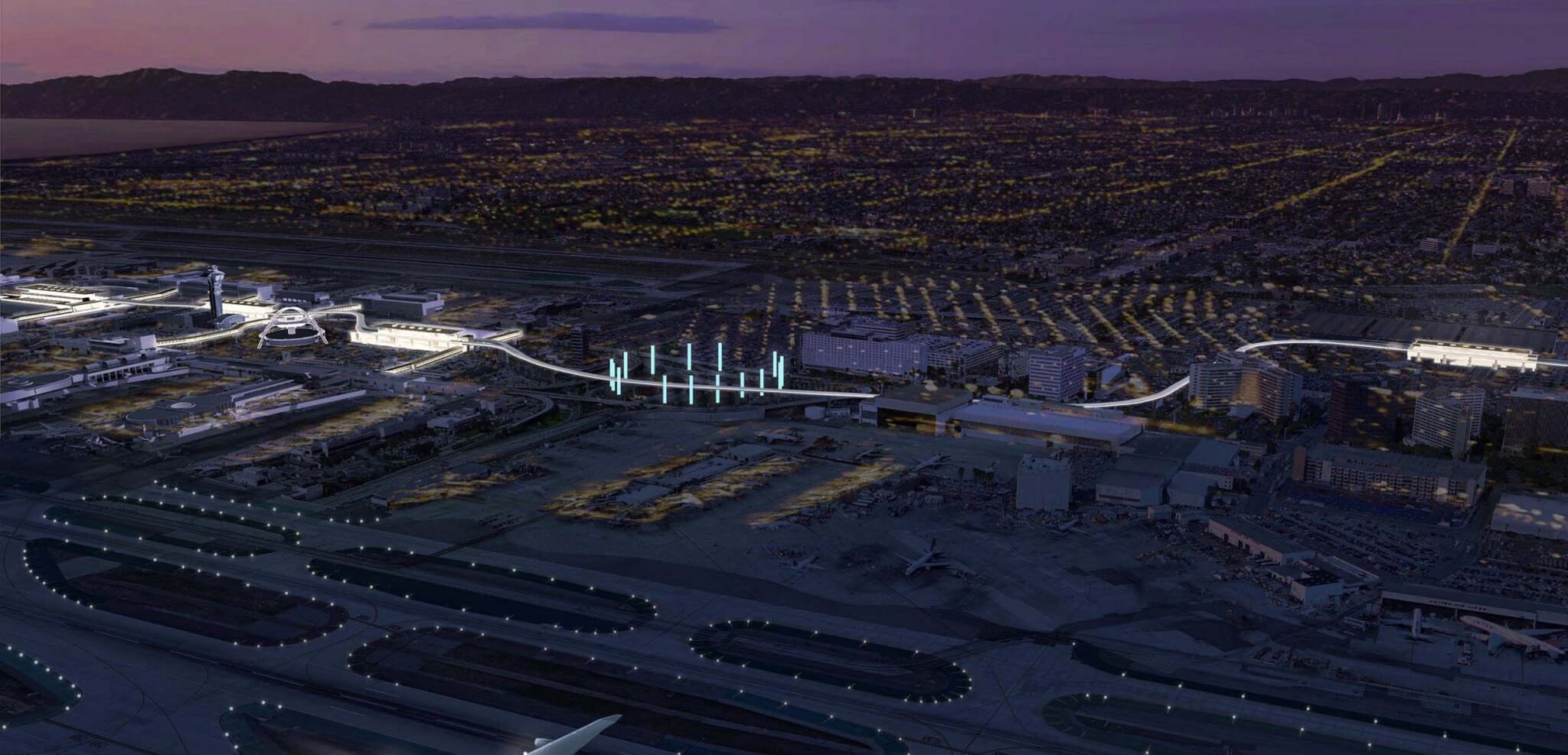 Aerial view at dusk in Los Angeles of people mover at Los Angeles International Airport (LAX) in California