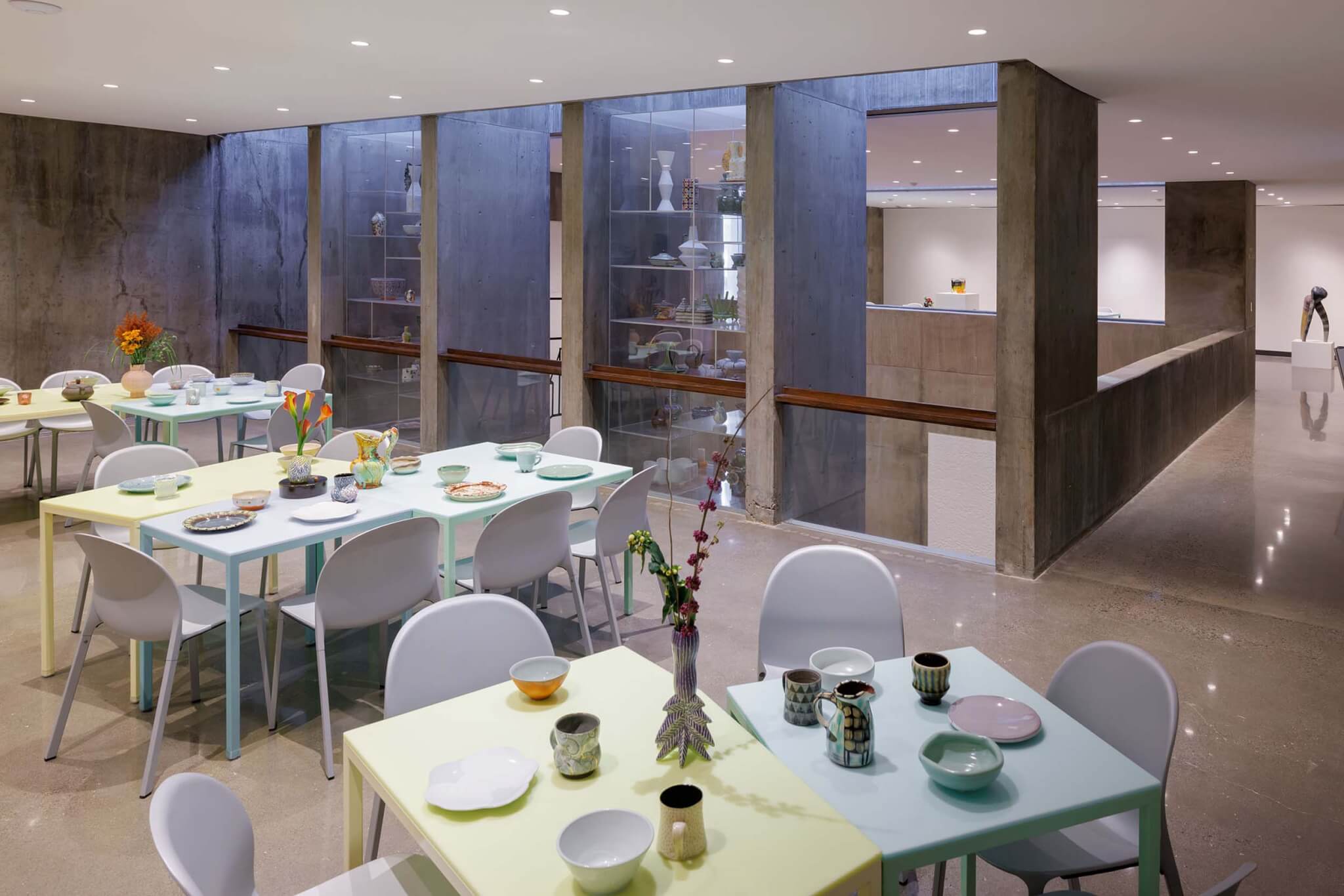 interior view of Louise cafe showing tables and glass cases