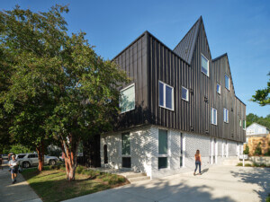 LOHA jagged roof with metal-clad and white brick exterior