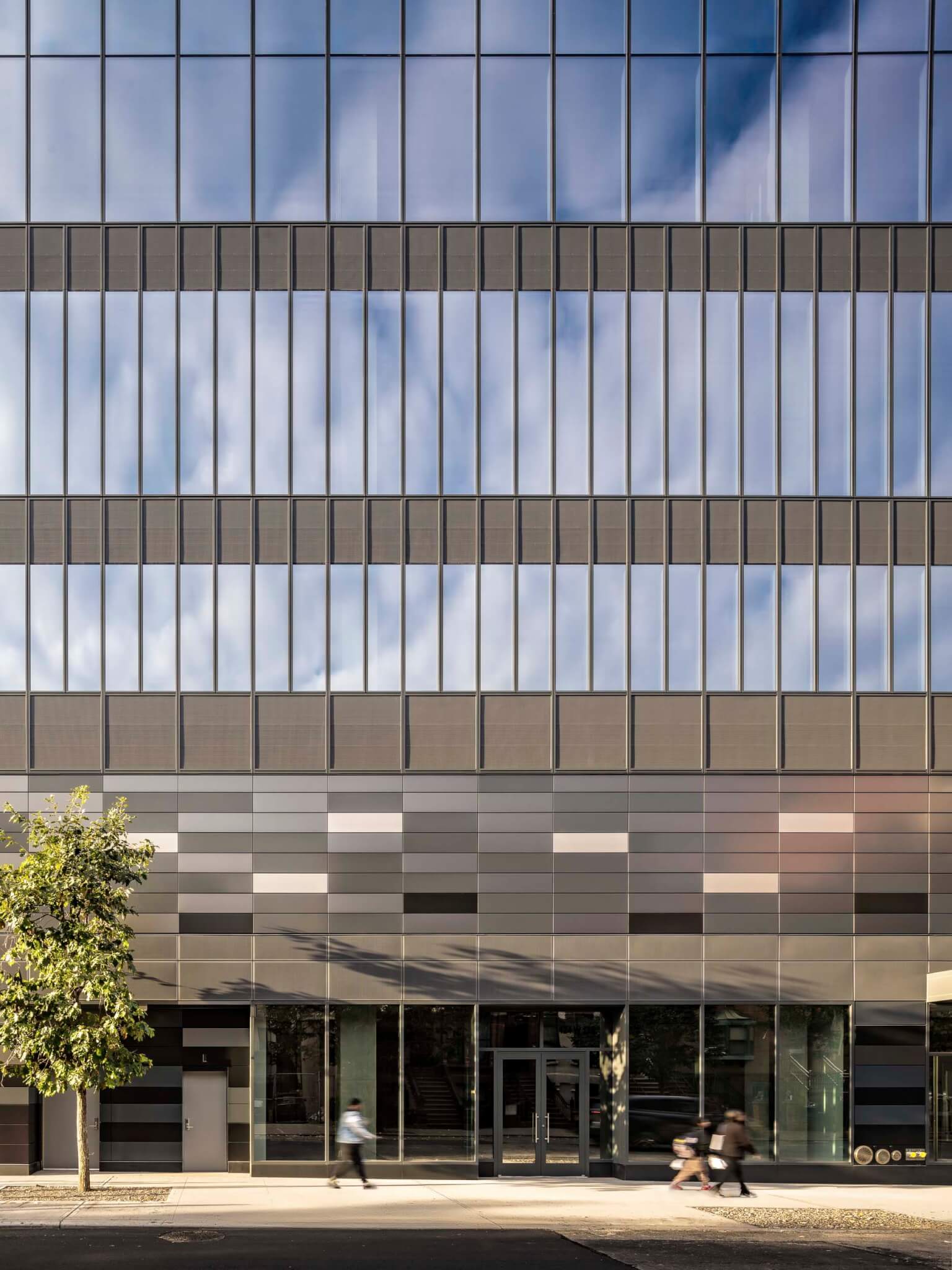 curtain wall and metal panels on the podium 