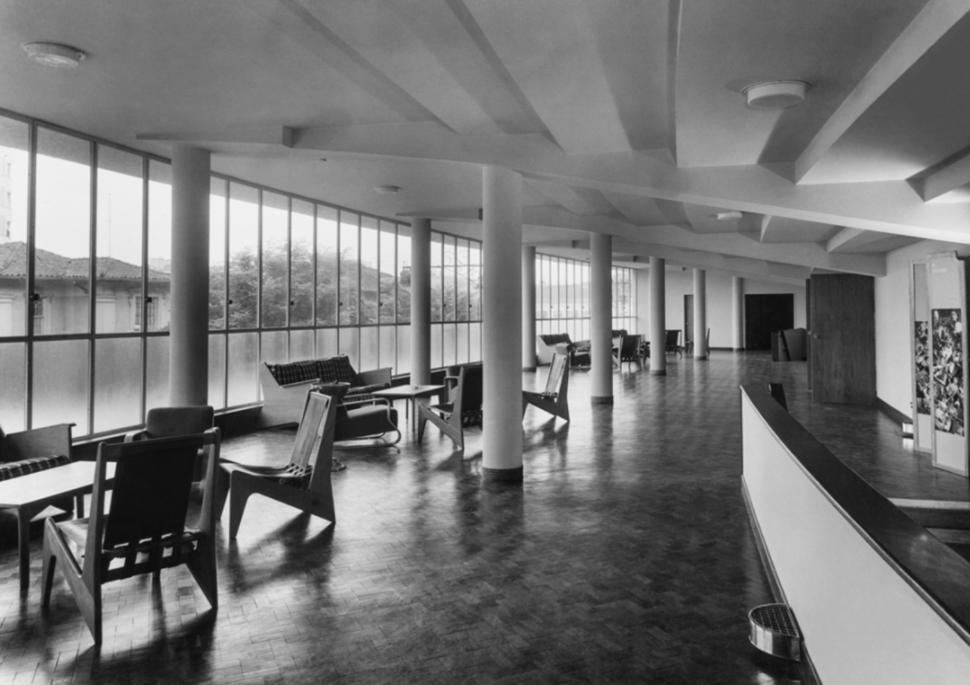 black and white image of interior of theater corridor