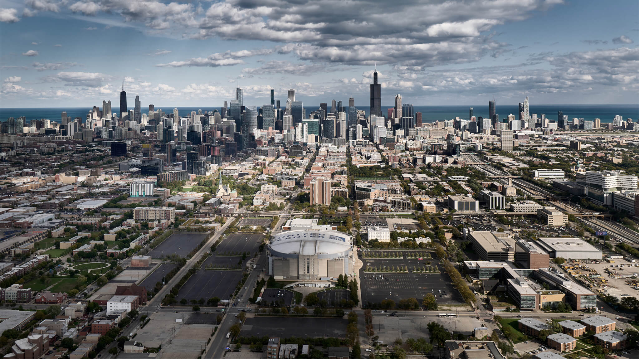 aerial view of United Center today with Chicago skyline in the distance