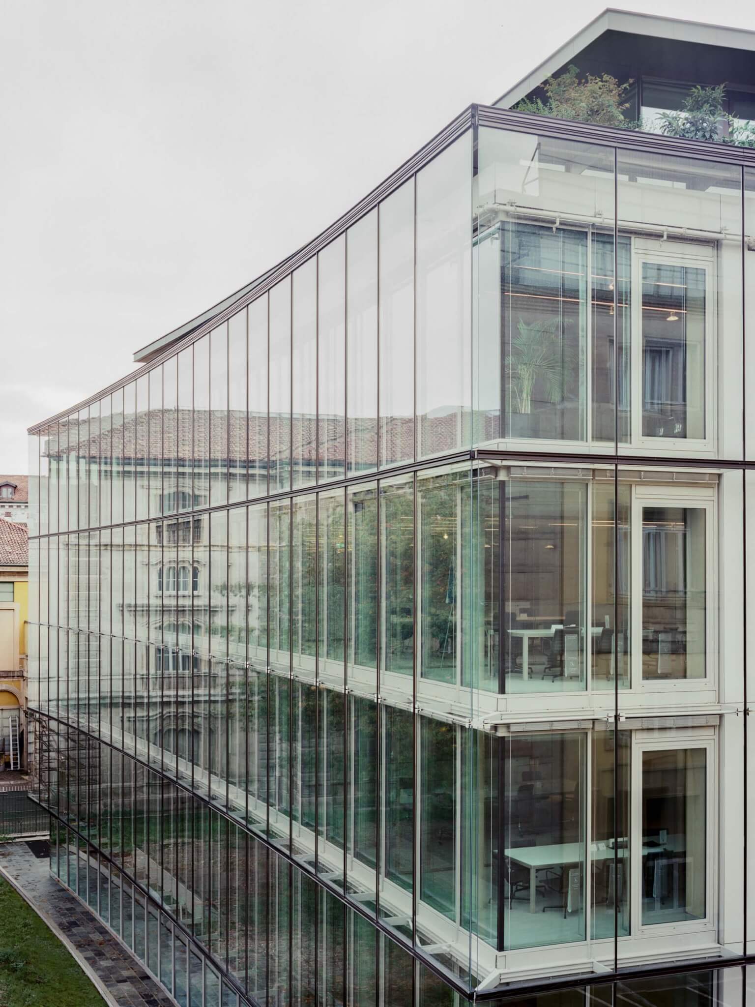 glass office building by Park Associati