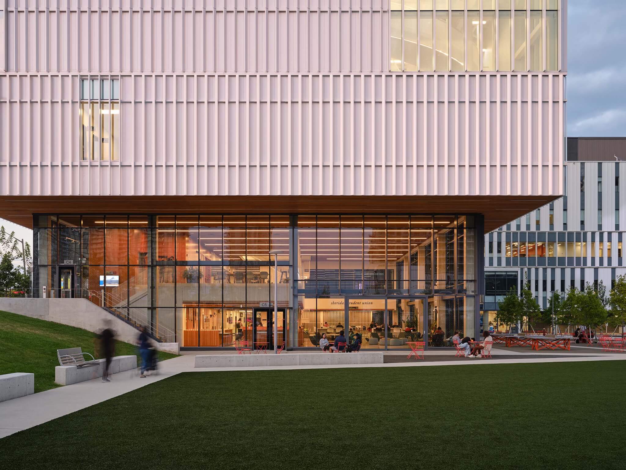 glass-enclosed atrium occupies the ground floor of the building