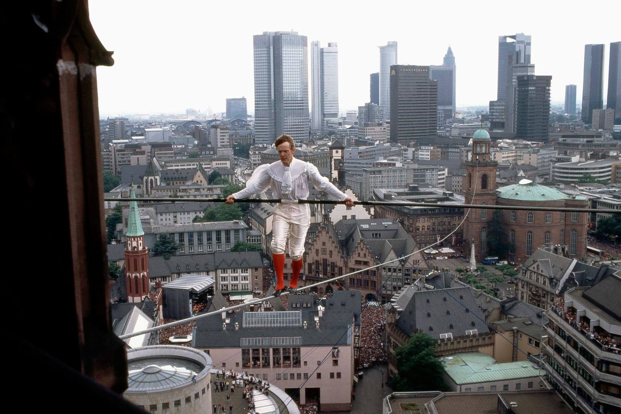 Philippe Petit walking on a wire in Frankfurt