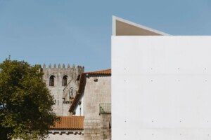 white pavilion building and the historic building of the pavilion at Monastery of Leça do Balio