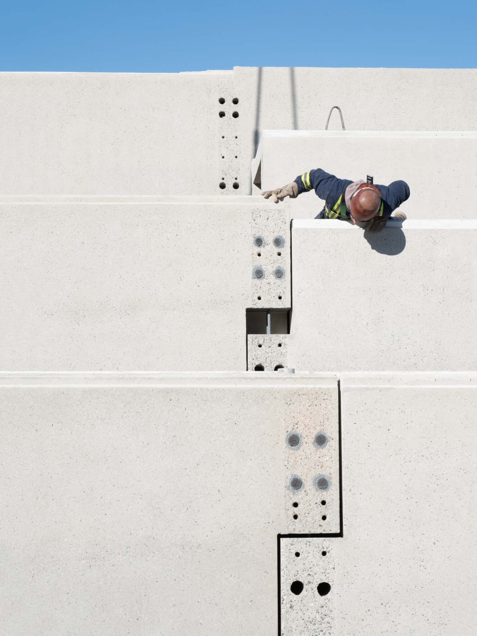 construction worker checking the connection by at Arthur Erickson’s Museum of Anthropology in Vancouver