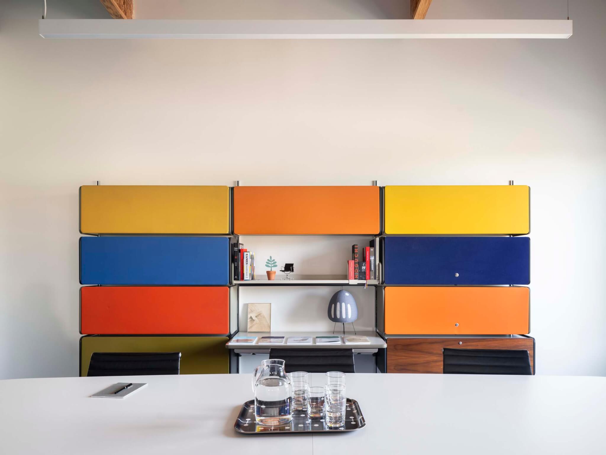 Eames Institute office and archive space in Richmond, California. Eames furniture and primary color palette.