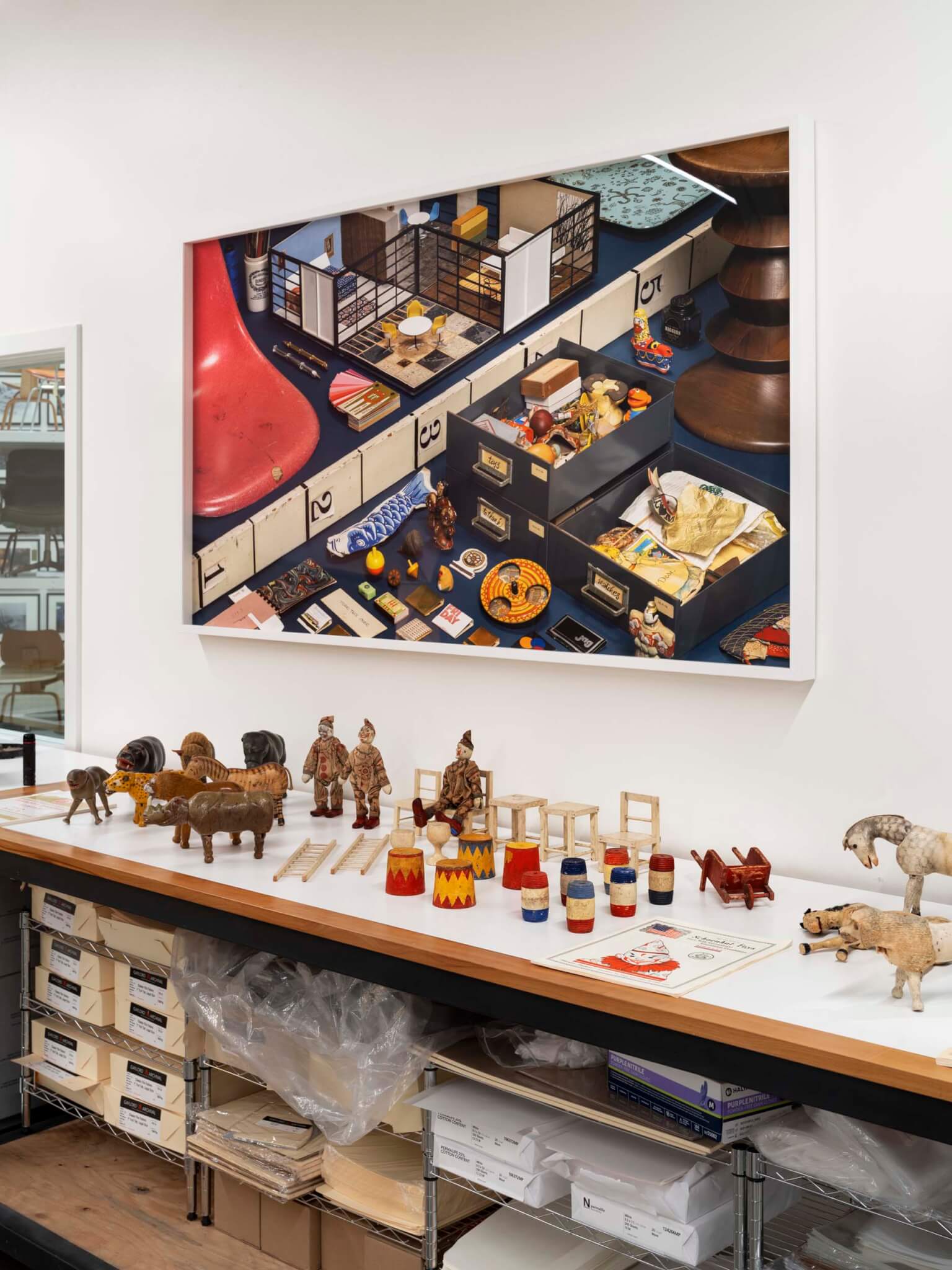 Eames Institute office and archive space in Richmond, California. Small animal figurines in the archive space of midcentury furniture institute.