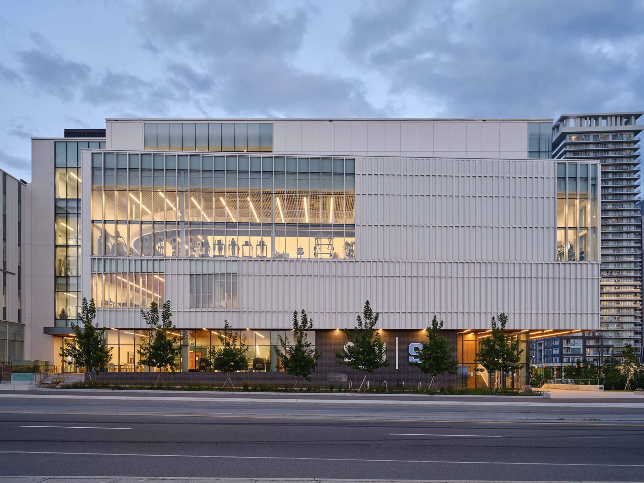 Sheridan College Student Life Center building at dusk