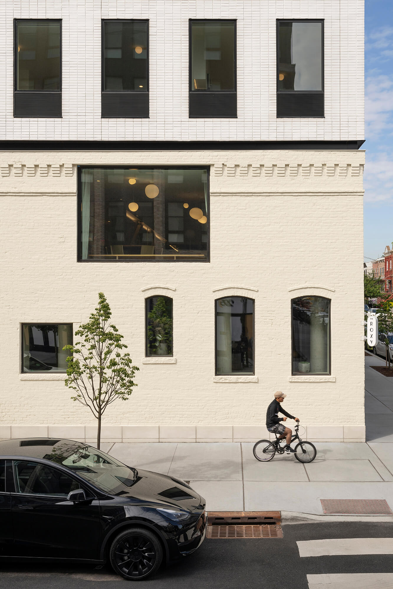 the base of the building was restored and is a beige color