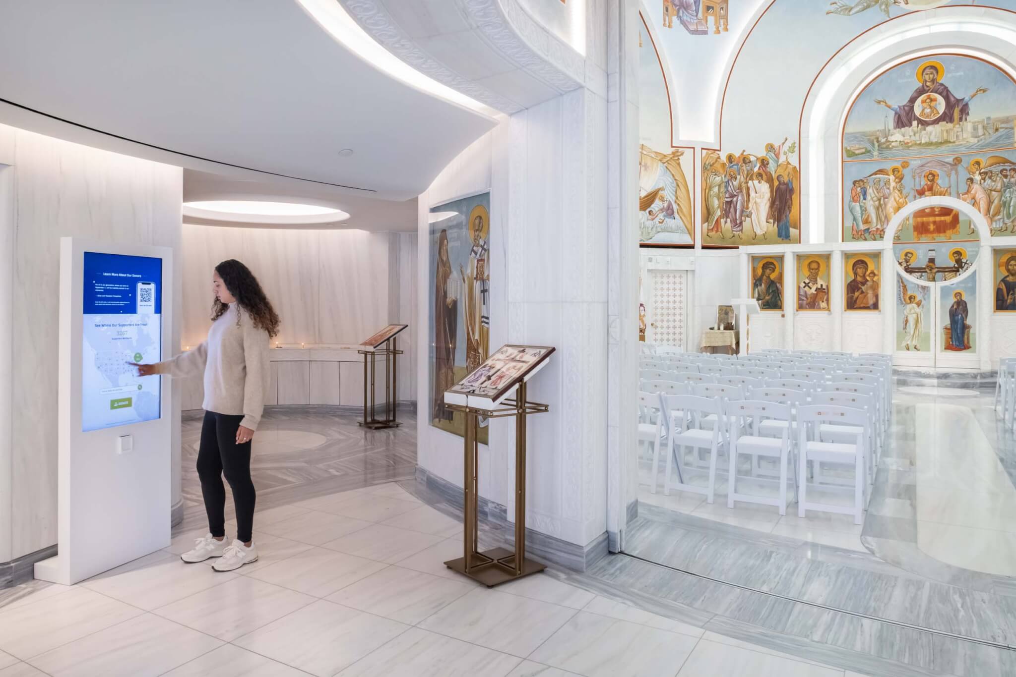 person using kiosks inside the church