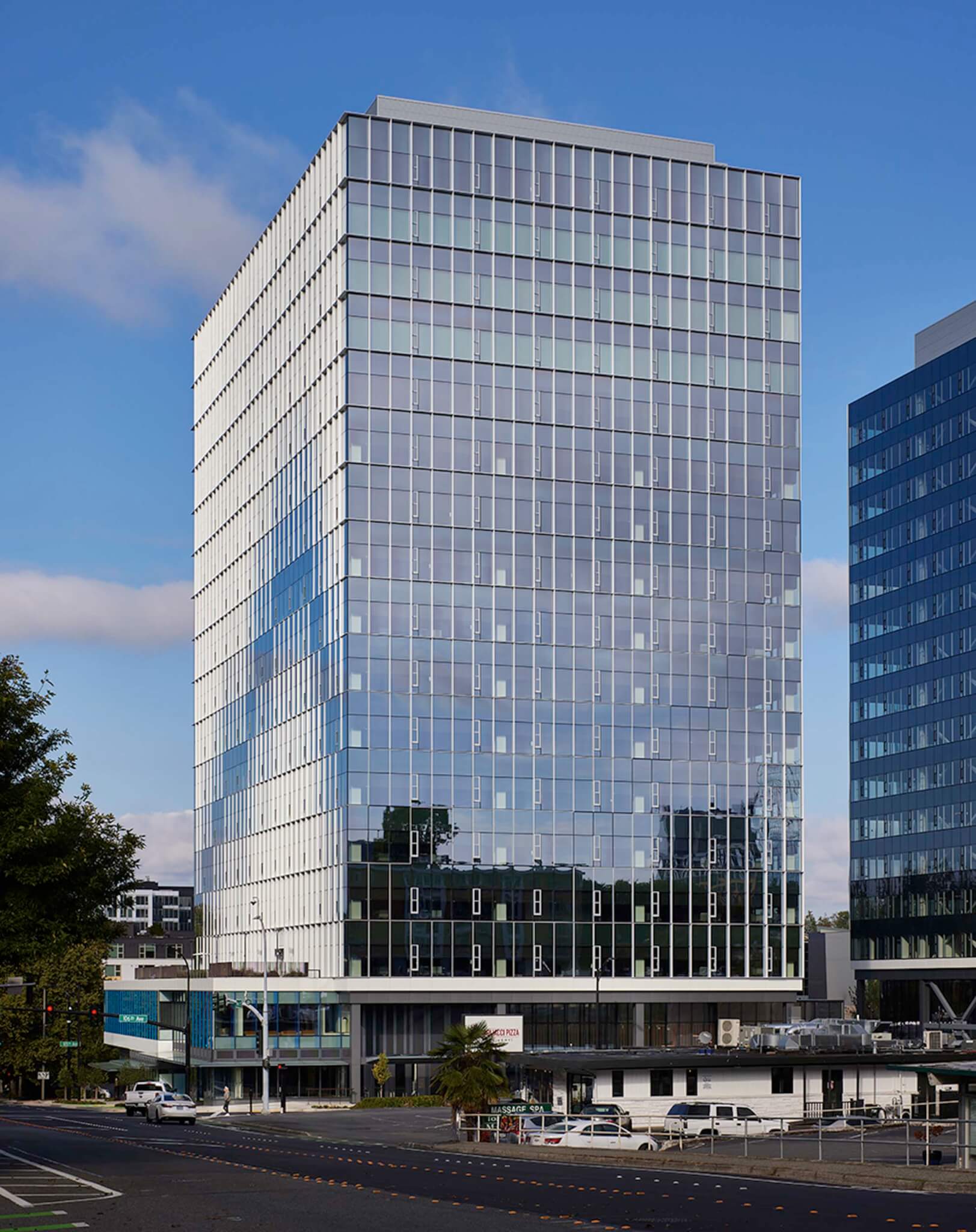 aluminum projections form a stream across the facade of West Main designed by Graphite Design Group