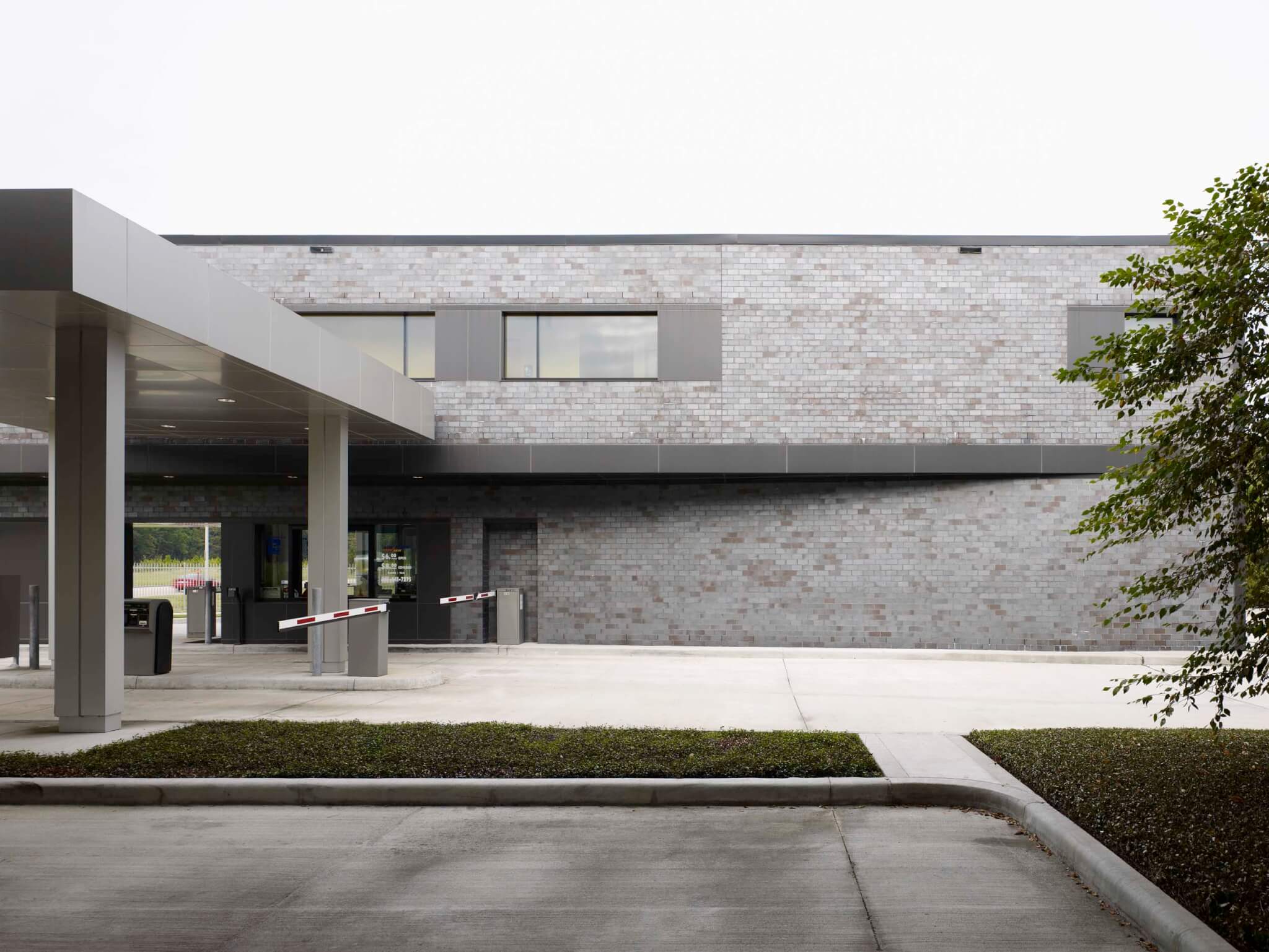 administrative building at a parking facility designed for the Houston airport