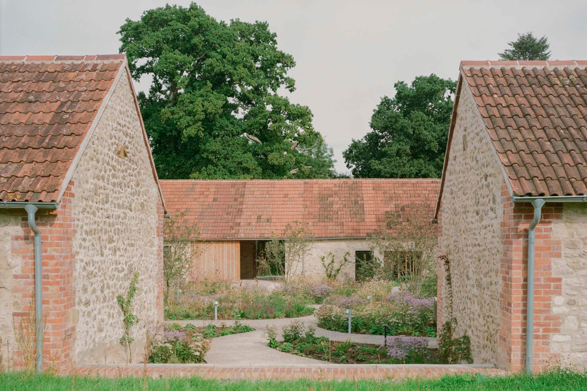 old brick farm buildings forming Wraxall Yard