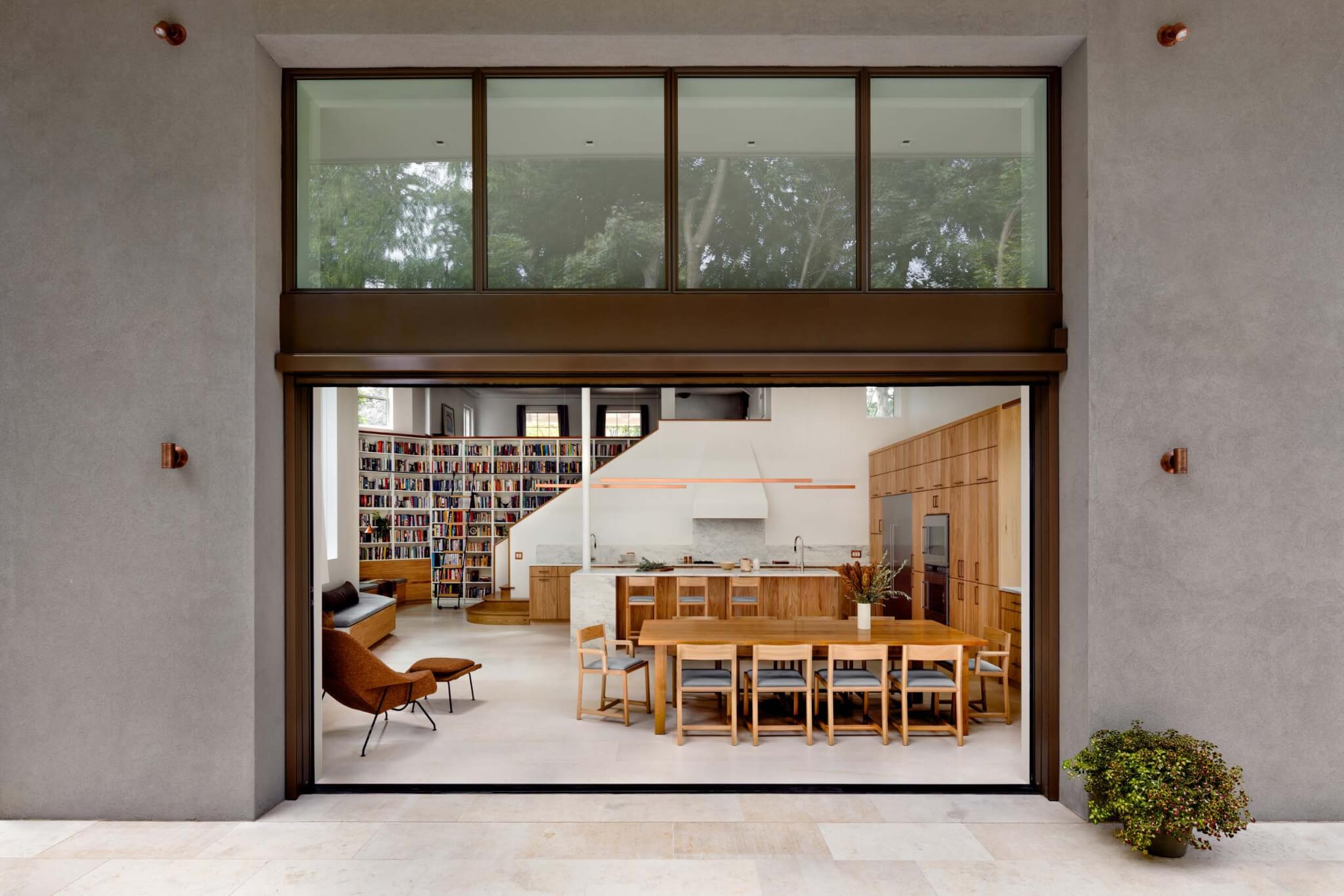 Sliding glass doors reveal a new library at Cleveland Park House