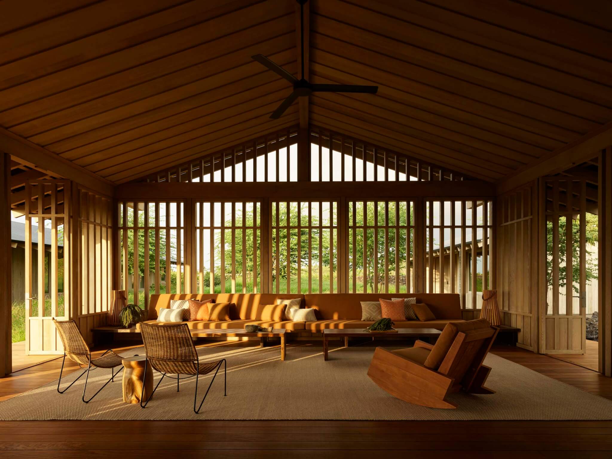 A minimalist living room with slatted oak designed by Walker Warner