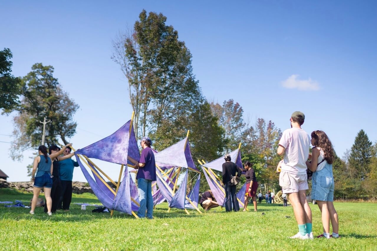 purple fabrics on wood structures