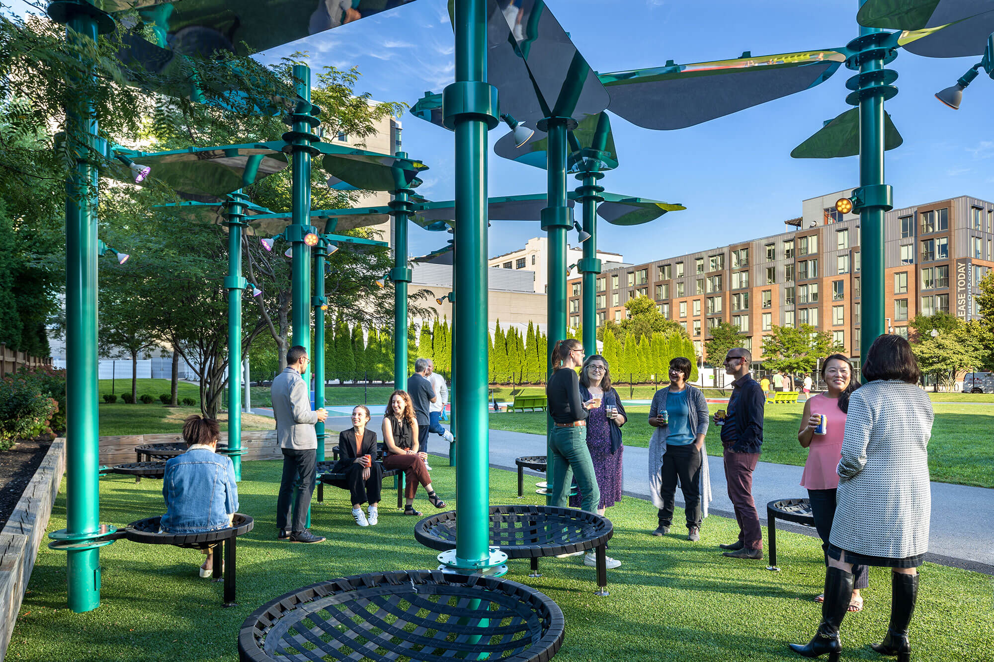 people gather around new installation by Arrowstreet on Lawn on D in Boston