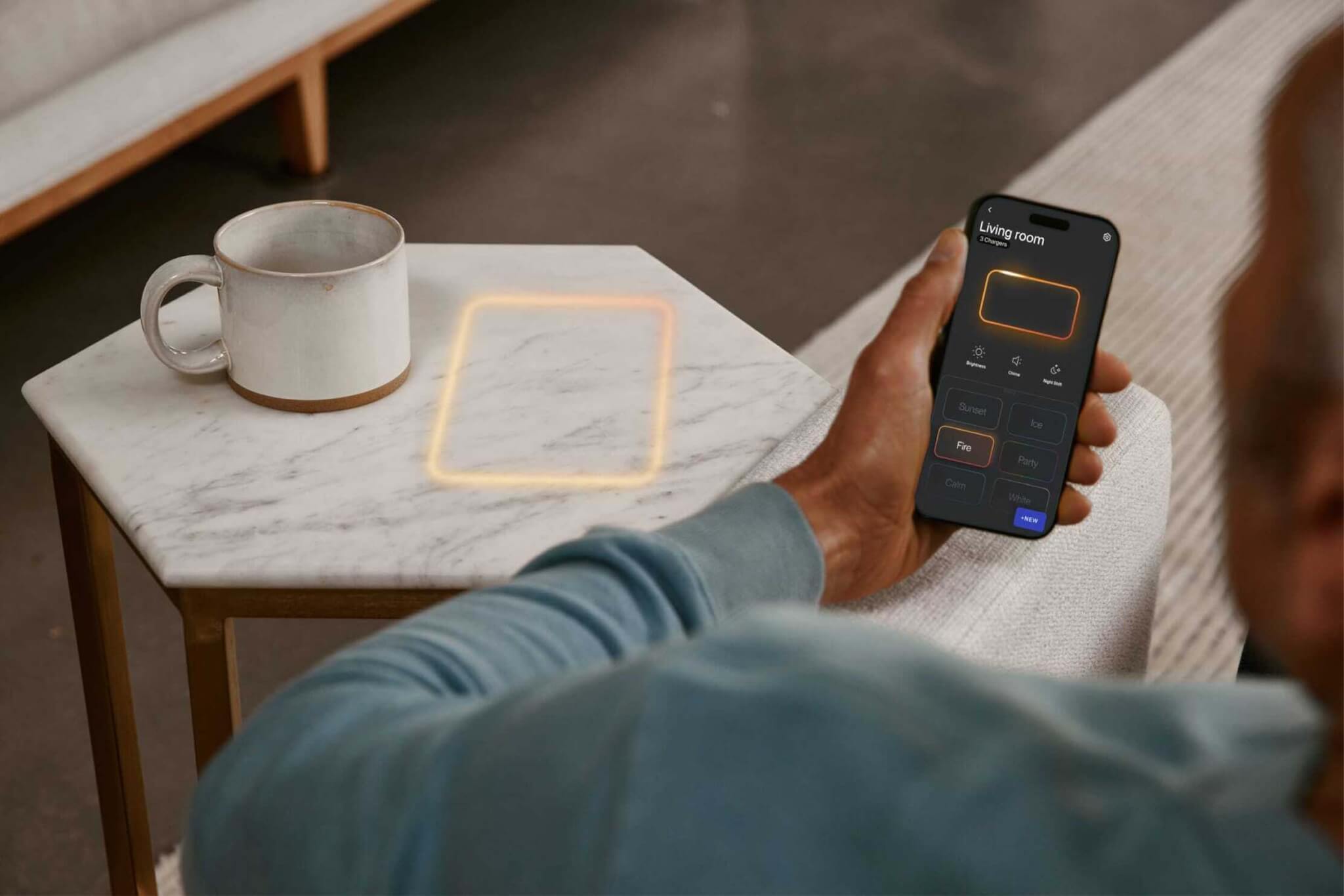 A wireless charging station from Freepower on a table