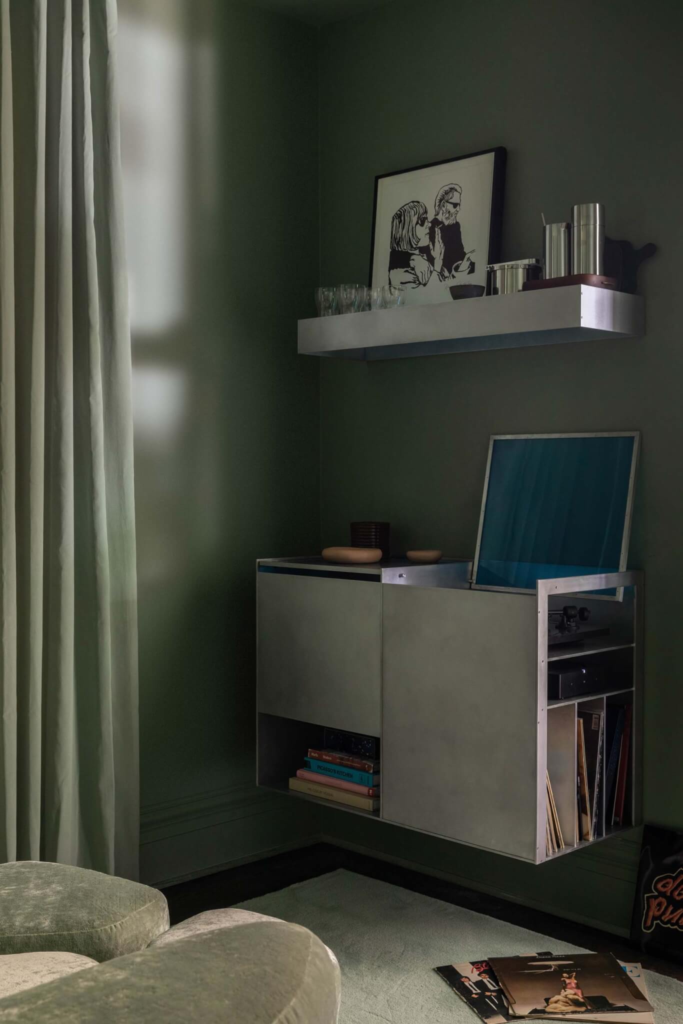 A record player and bar counter in a living room, inspired by Judd