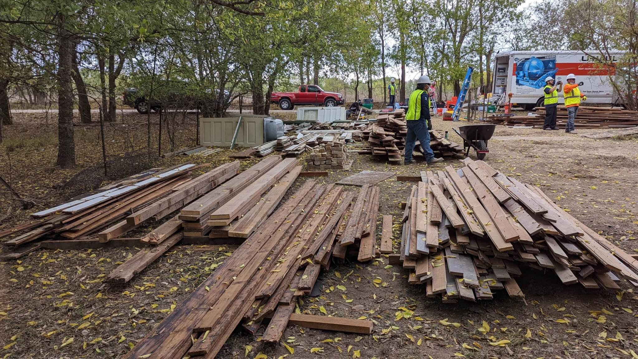 lumber stacked on the ground