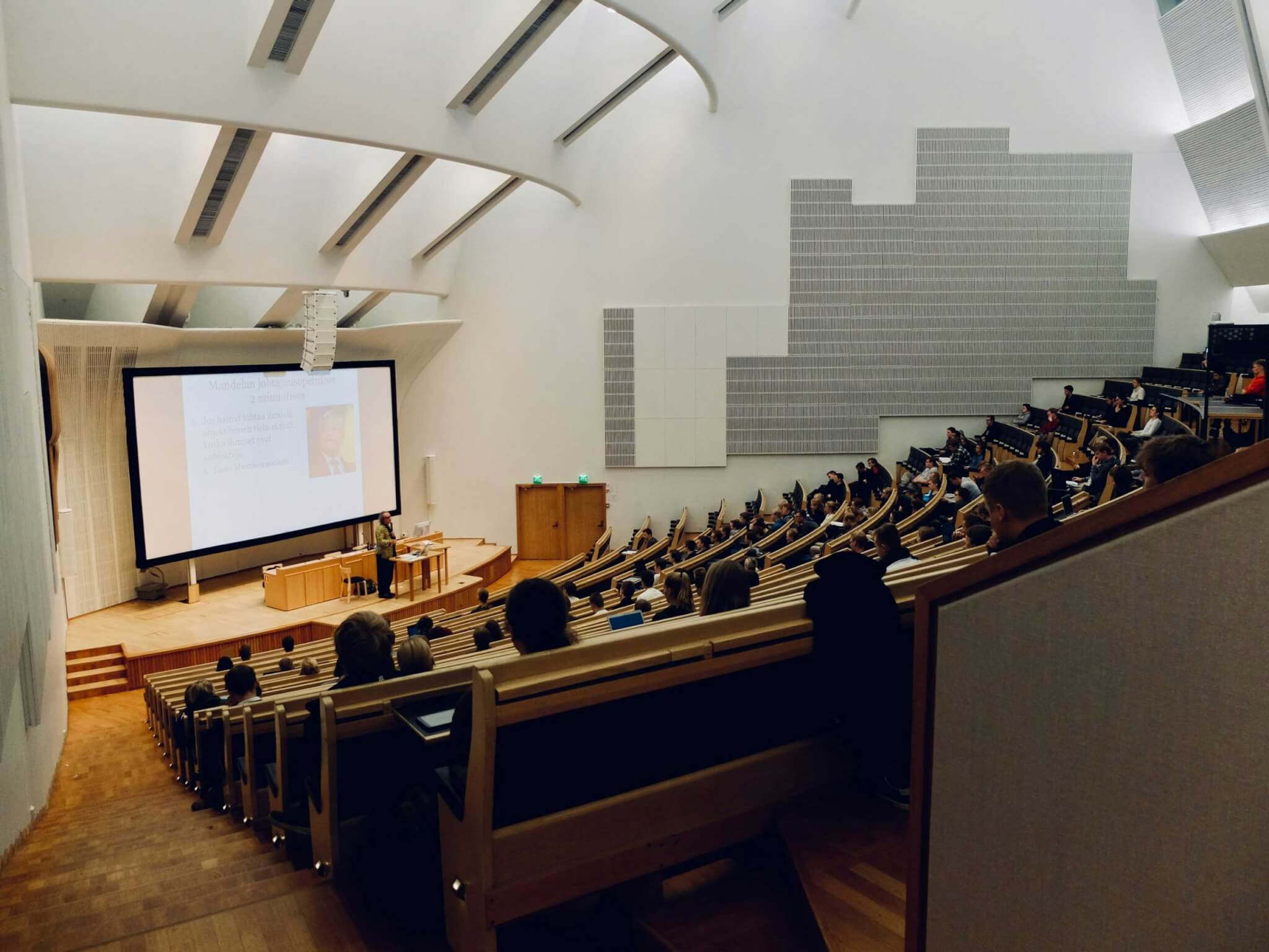 students attending class in lecture hall