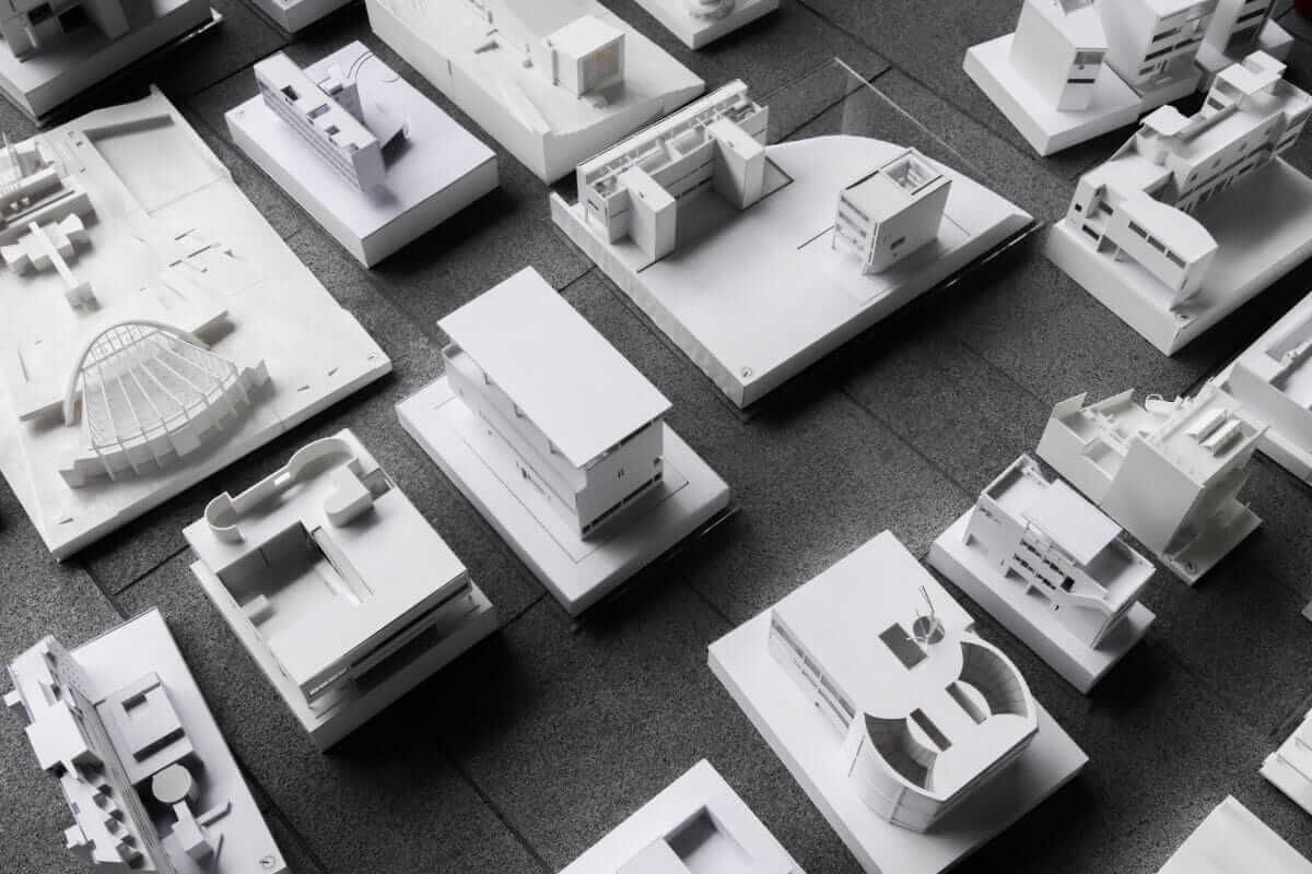 Le Corbusier models on table