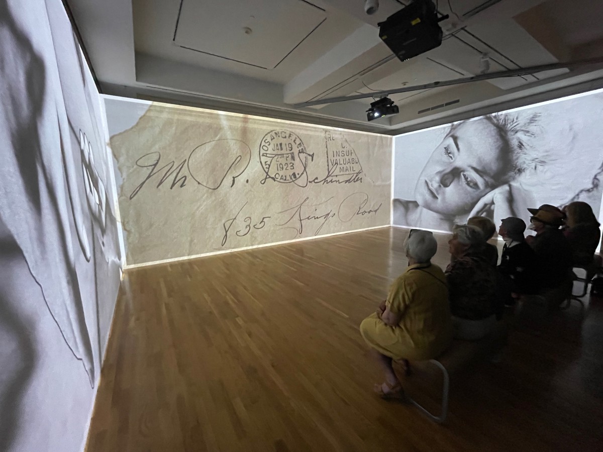 Letter projected on wall in gallery