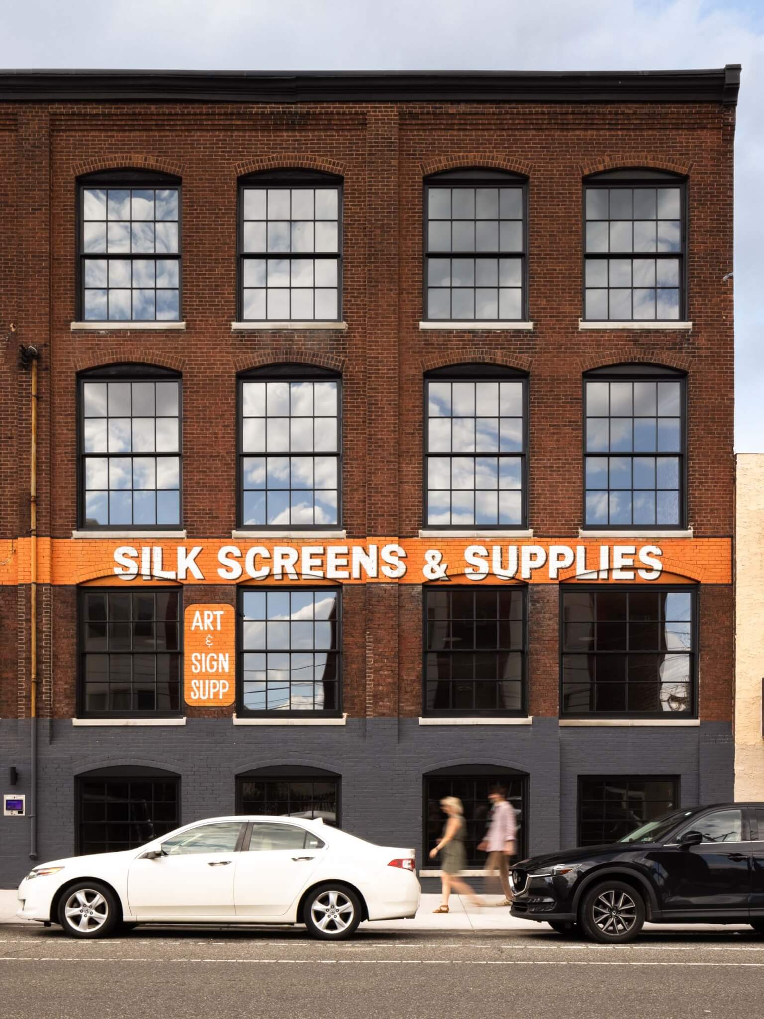 Kaminski+Pew opted for preservation of the orange signage on the brick exterior